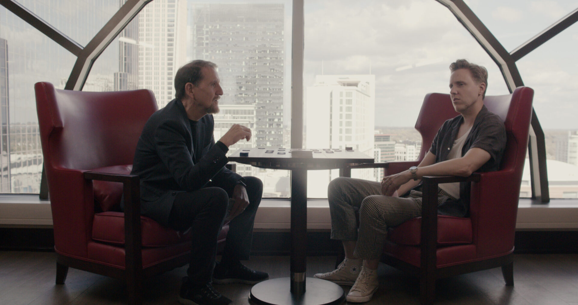 Image of Gary Fry and Cody Fry having a conversation during the documentary Tremolo
